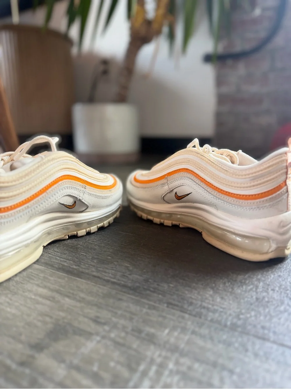 Nike Woman’s White Sneakers with Orange Accents